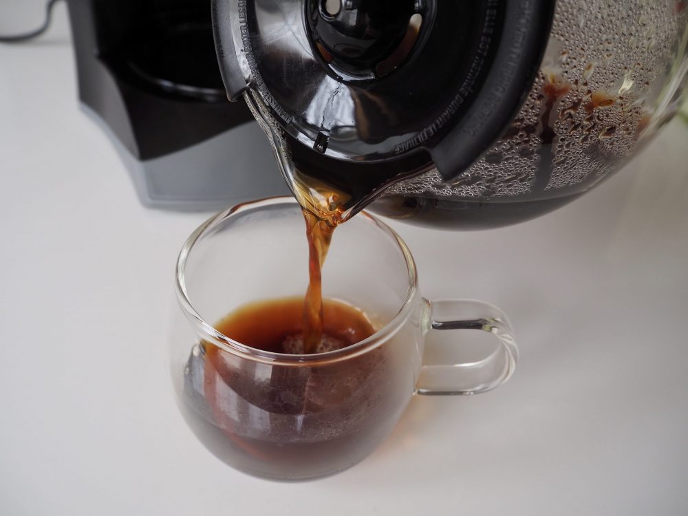 Mr. Coffee pouring