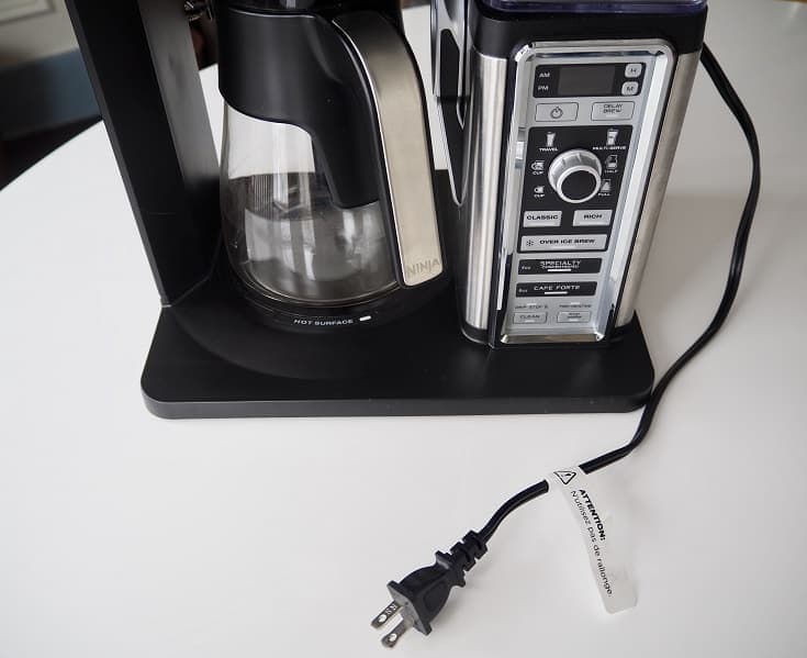 Unplug your Ninja Coffee Bar and wait a few minutes