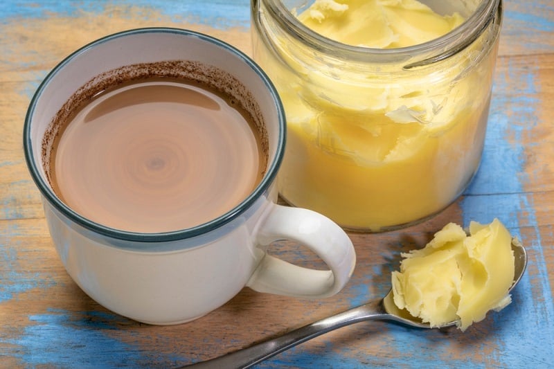 cup of fresh fatty coffee with ghee_marekuliasz_shutterstock