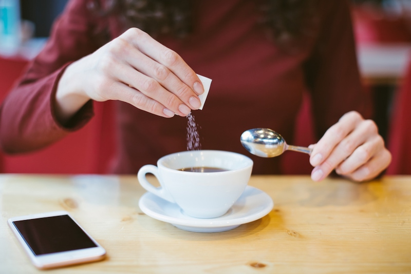 pouring salt into coffee