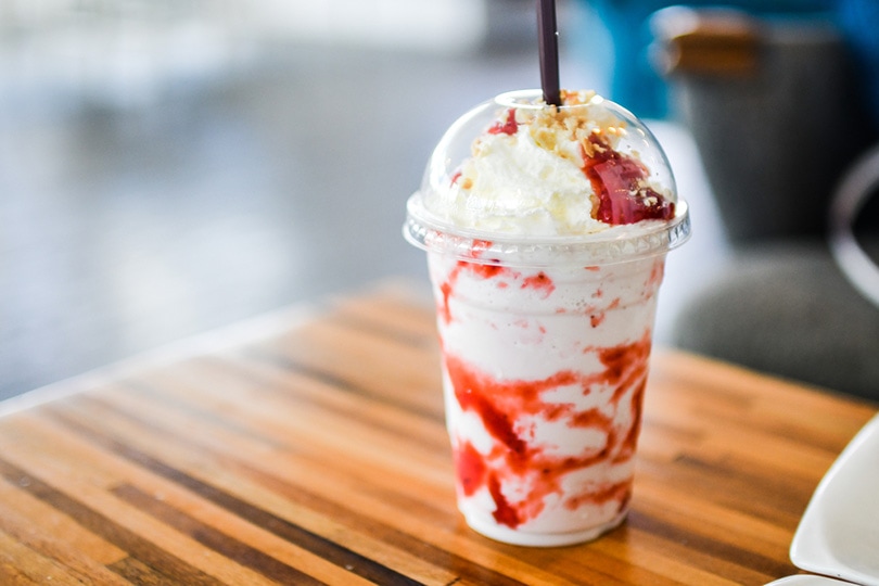Strawberry Cheesecake Frappuccino on wooden table