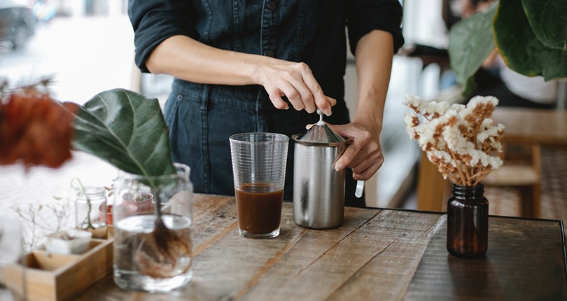 barista preparing iced chocolate coffee