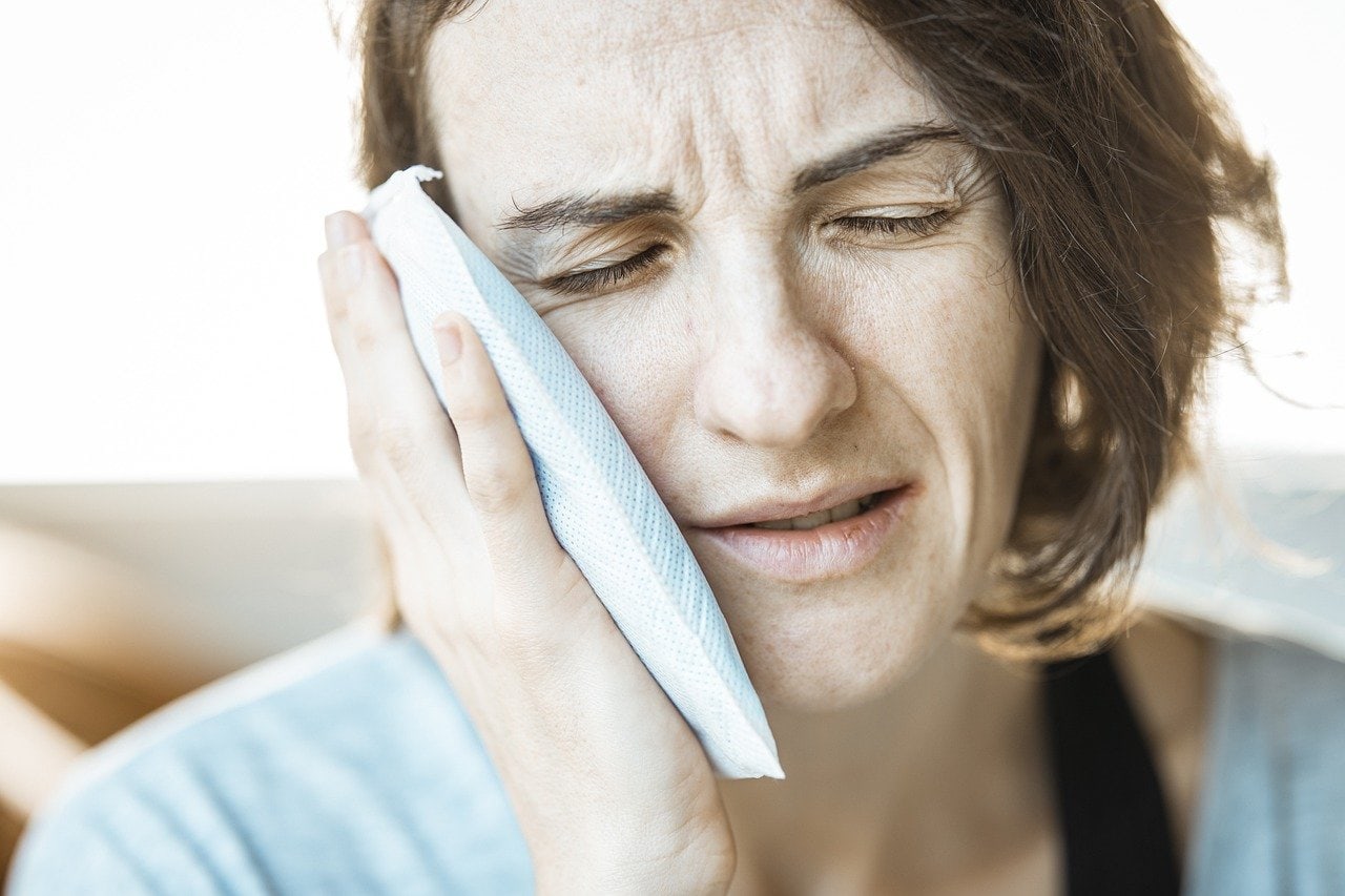 girl undergone tooth extraction