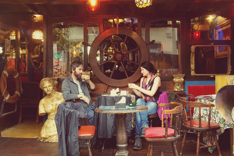 two person sitting at a coffee shop in Argentina
