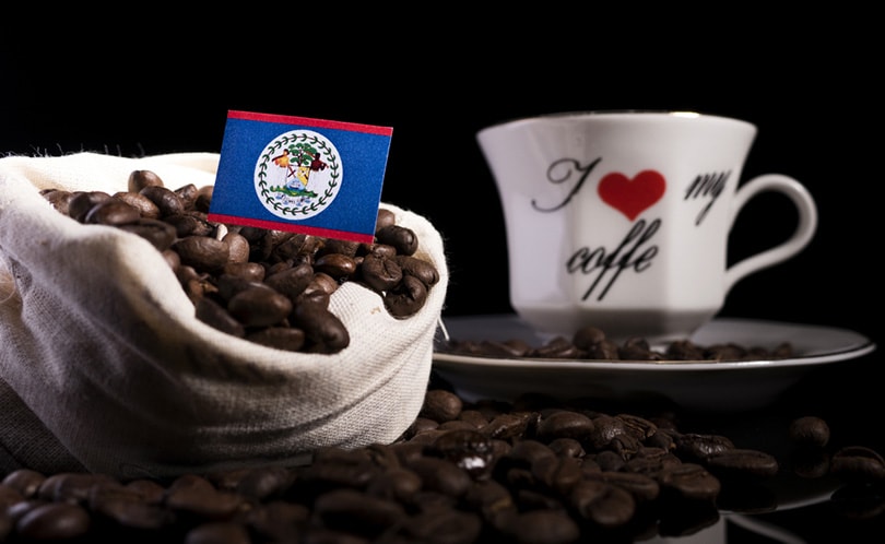 Belize flag in a bag with coffee beans