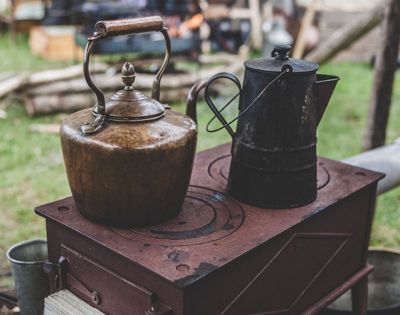 historical coffee percolator kettle and stove