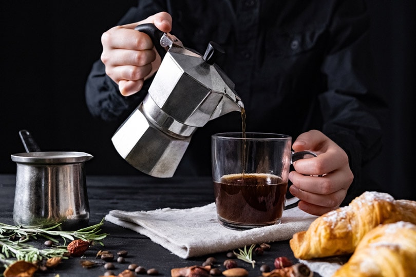 pouring coffee from percolator