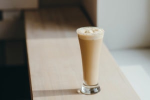coffee milkshake on a wooden table