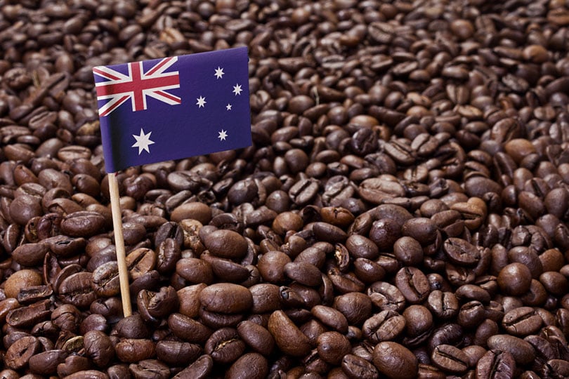 flag of Australia sticking in roasted coffee beans