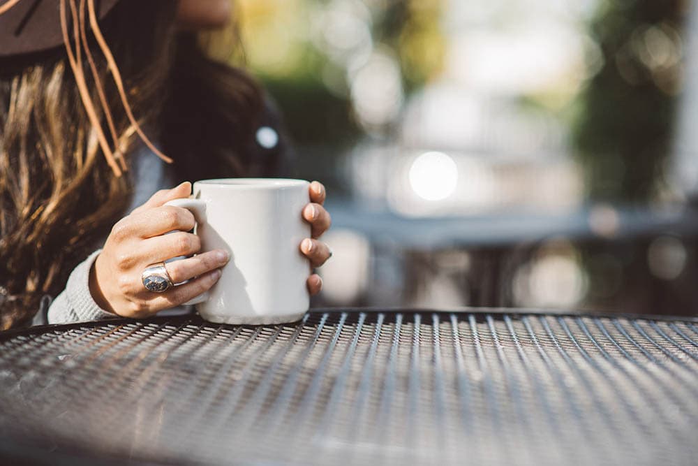 woman holding a mug