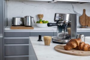 Breville The Bambino Plus Compact Espresso Machine on countertop