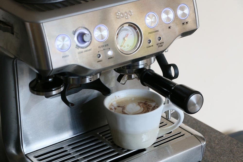 coffee machine and a cup of coffee