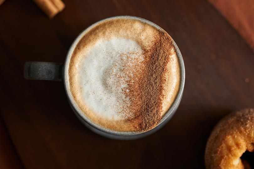 hot and fresh cinnamon coffee on a cup