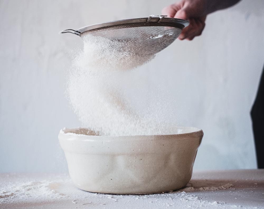 sifting powdered sugar
