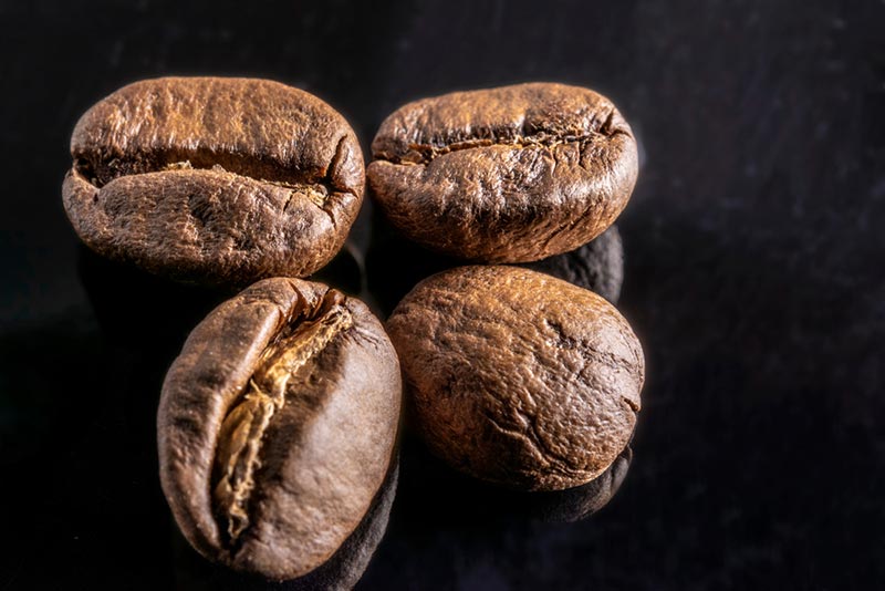 coffee beans on a black table