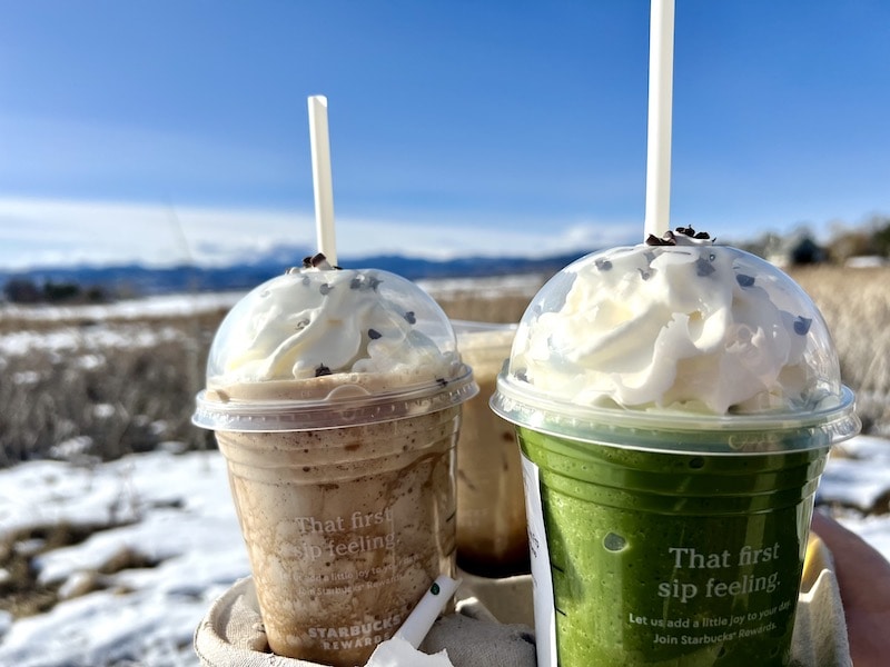 Two Starbucks Frappuccinos matcha and coffee with whipped cream and chocolate curls_Kate