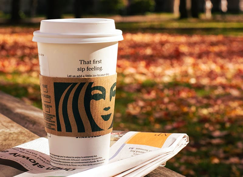 a cup of Starbucks drink during fall