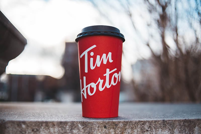 a cup of hot Tim Hortons drink