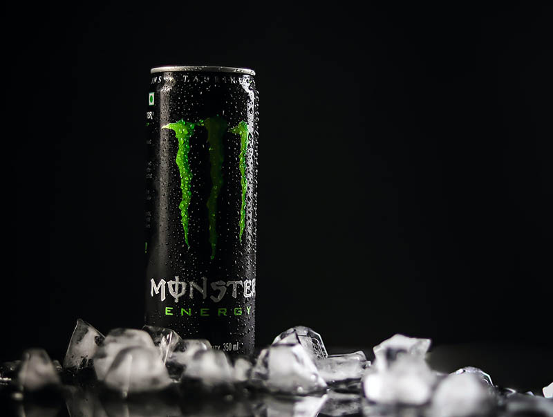 monster energy drink surrounded with ice