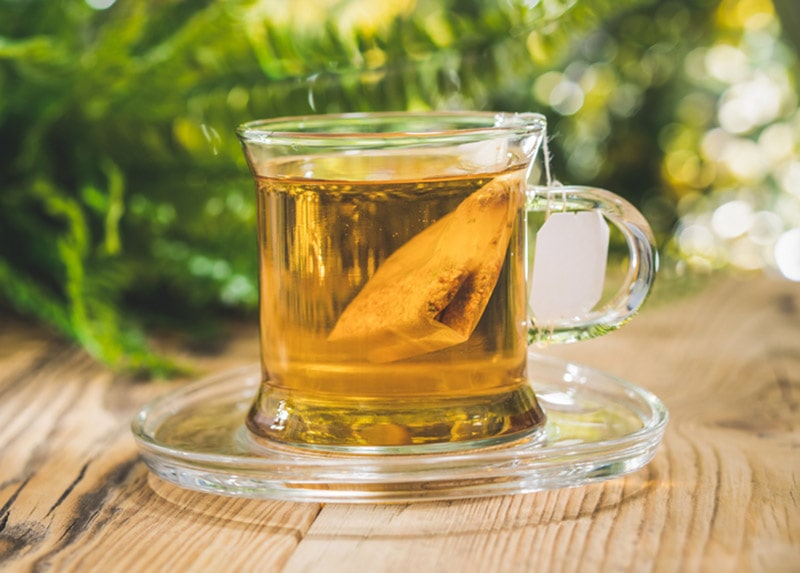 glass cup with tea bag