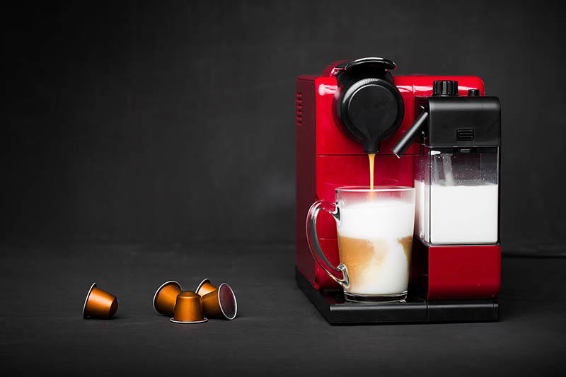 making coffee using nespresso machine