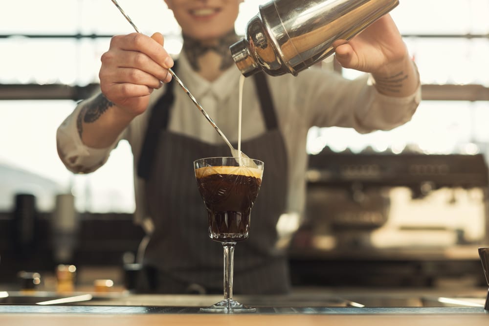 barista preparing coffee cocktail
